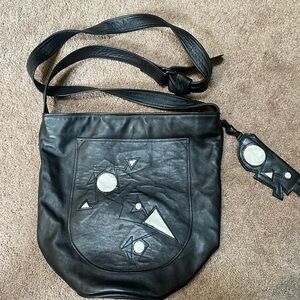 Lovely Artistic Design Black Leather Shoulder or Crossbody Purse.